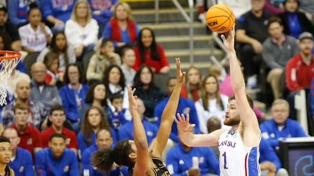 Kansas senior center Hunter Dickinson (1) shoots for two against Wichita State during the second half of Saturday's game inside T-Mobile Center in Kansas City.